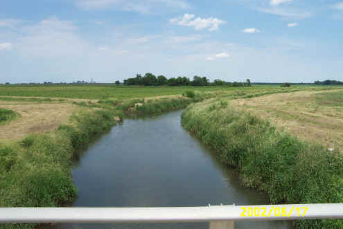 Photograph looking upstream along Sugar Creek, Benton County, IN, 17 June 2002.